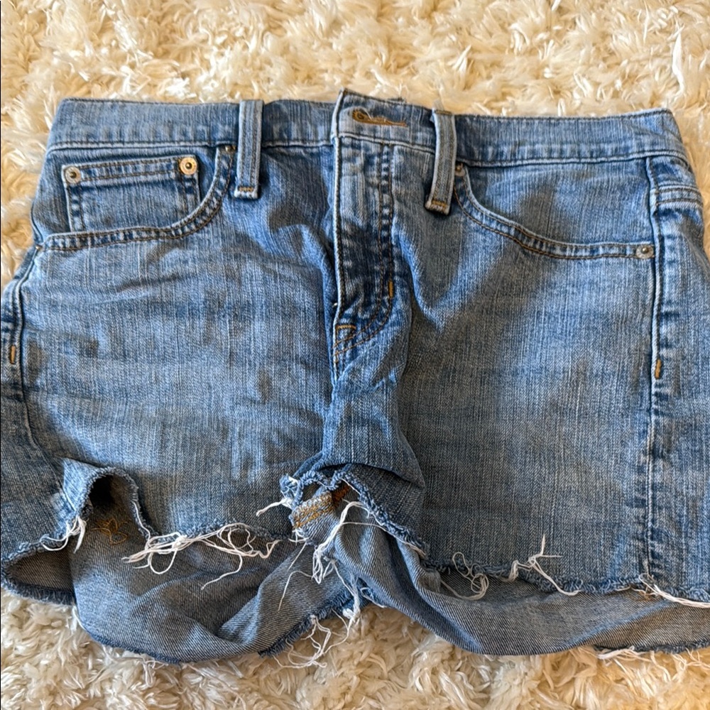 Mid rise blue denim shorts